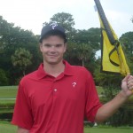 Chris Miller with TPI shirt and flag